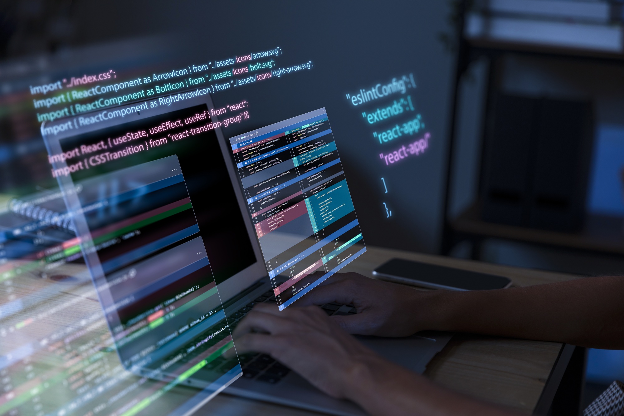Developer typing on a laptop with holographic code overlays representing modern application development